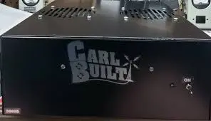 A black box with the words " carl built ".