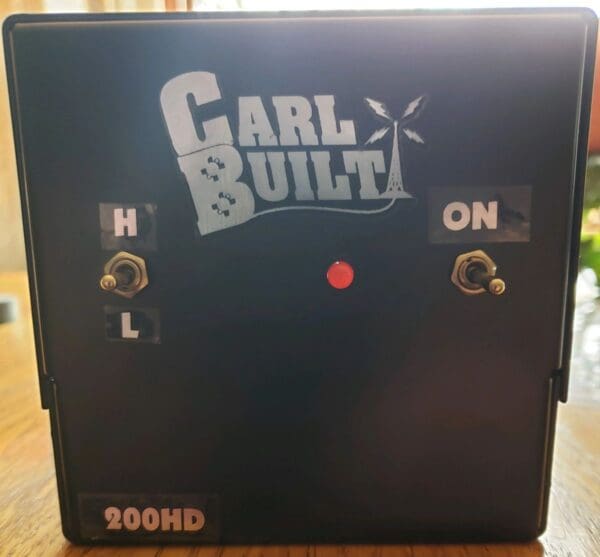 A black box with the words " carl built ".