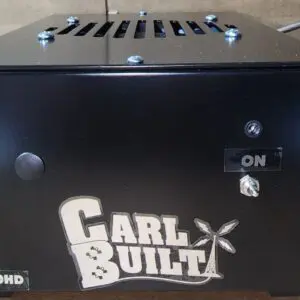 A black box with the words " carl & built " on it.