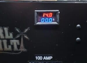 A close up of the power consumption display on a black box