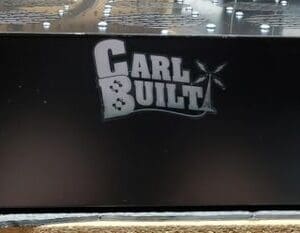 A black box with the words " carl built " on it.