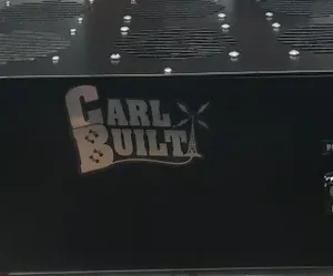 A black box with the words " carl built ".