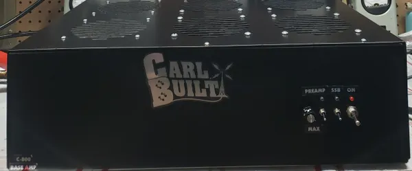 A black box with the words " carl built ".